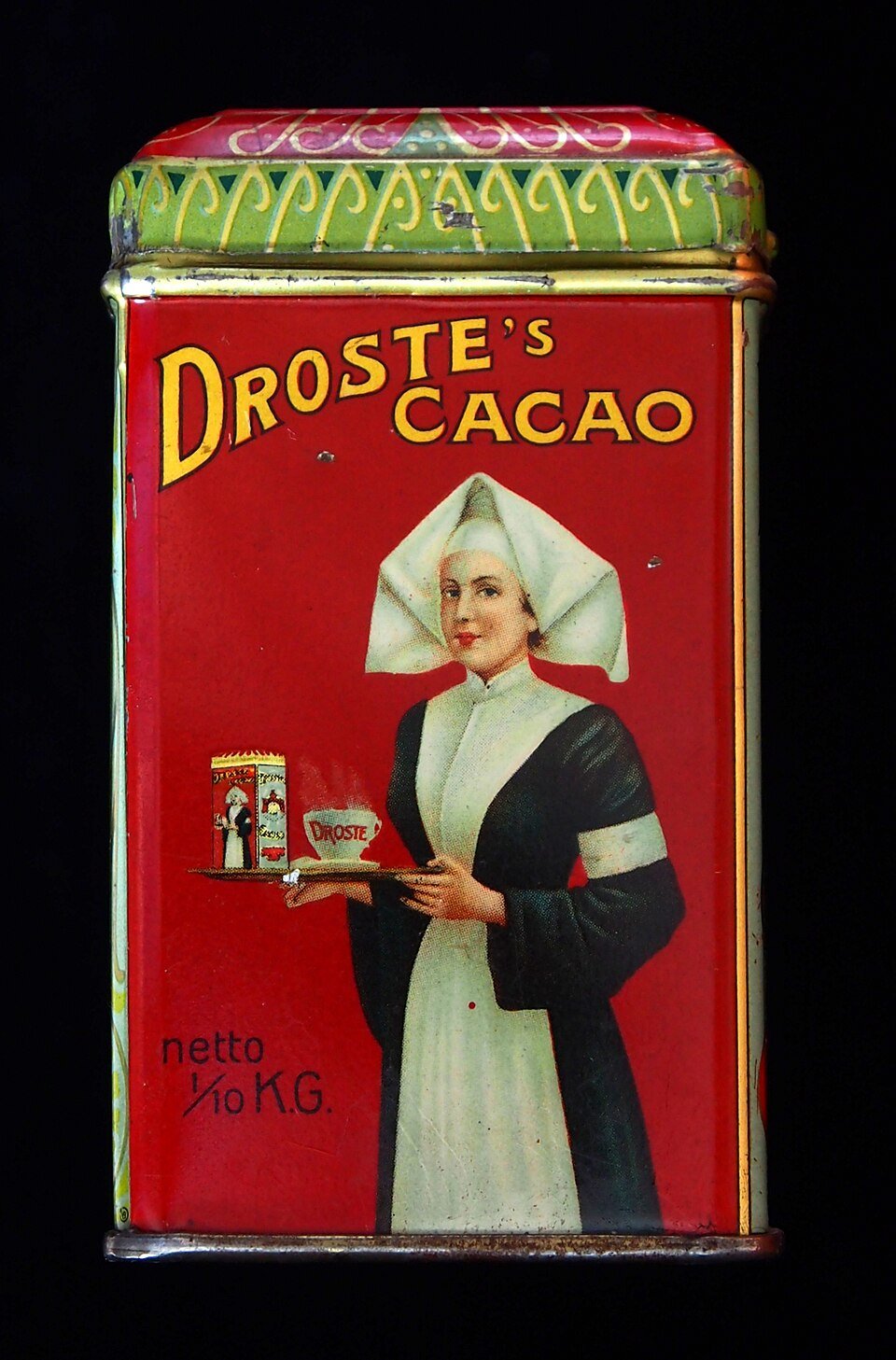 Lata de cacao Droste con la enfermera sosteniendo una bandeja donde se ve otra lata Droste más pequeña. Origen visual del efecto que lleva su nombre
